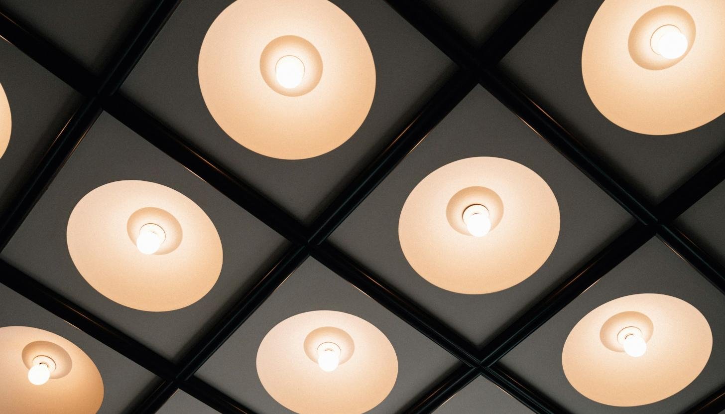 Recessed downlighting along a ceiling